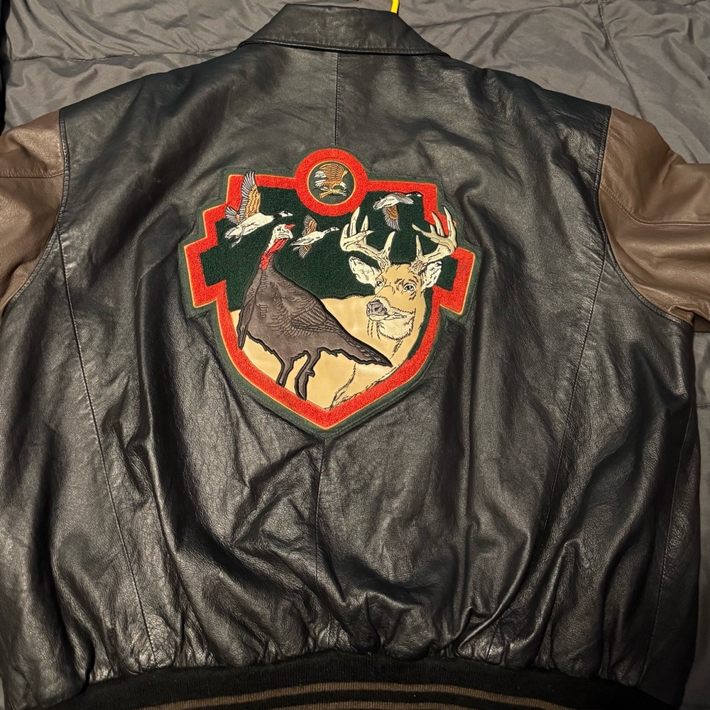 NA Hunting Club Black and Brown Leather Jacket with Embroidered Wildlife Patch